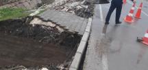 YOĞUN YAĞMUR SONUCU ÇÖKEN YOLA BELEDİYE ZABITA TRAFİK EKİPLERİ ANINDA TEBDİR ALDI
