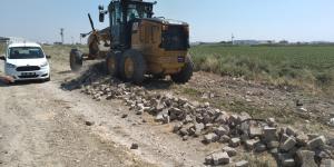 GÜZELBURÇ MAHALLESİNDE YOL AÇMA VE MALZEME SERME ÇALIŞMALARI