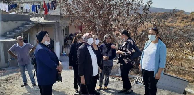 HATAY MHP KADIN KOLLARINDAN  YANGIN MAĞDURLARINA MORAL ZİYARETİ