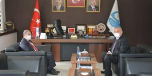 MKÜ REKTÖRÜ PROF. DR. HASAN KAYA BAŞKAN YILMAZ’I ZİYARET ETTİ