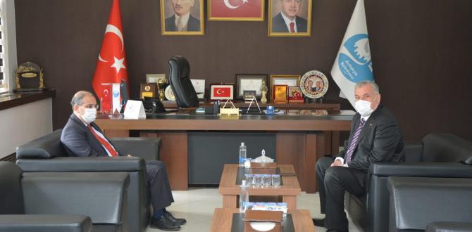 MKÜ REKTÖRÜ PROF. DR. HASAN KAYA BAŞKAN YILMAZ’I ZİYARET ETTİ