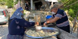 Kadınlar yapıyor, erkekler pişiriyor