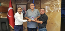 Başkan Bolat’a hizmet plaketi
