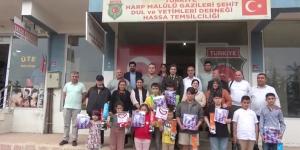 HASSA GARNİZON KOMUTANI ŞEHİT ÇOCUKLARINI UNUTMADI